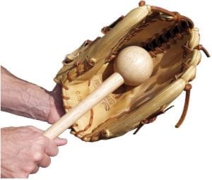 Breaking the glove using a glove mallet